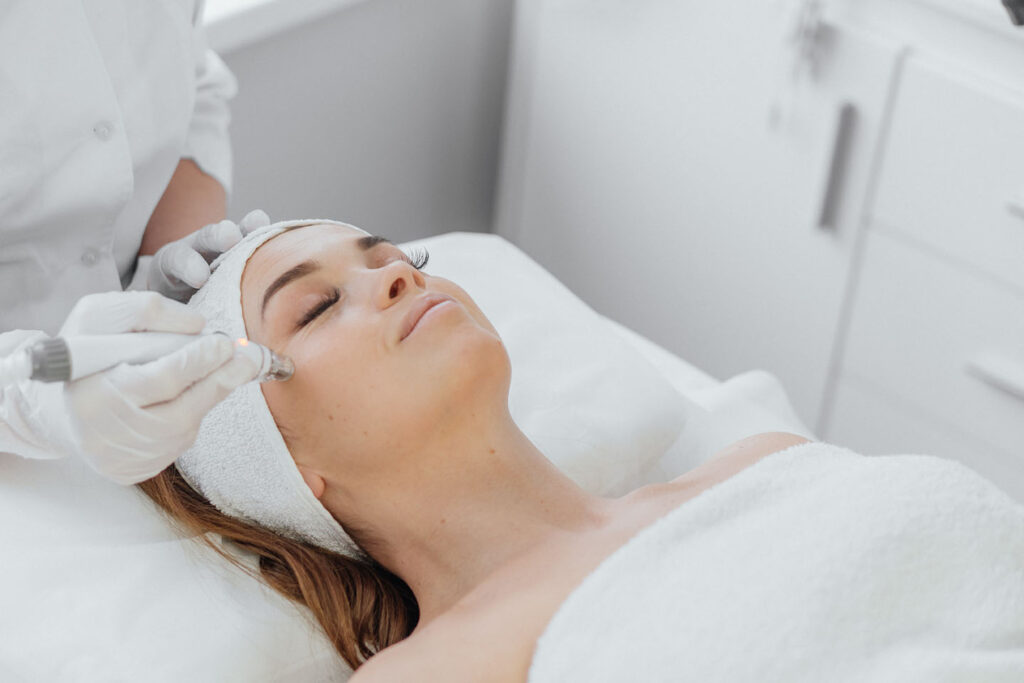 Relaxing spa session with face rejuvenation procedure.